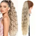 Long wavy ponytail hair extension for women, 26 inch synthetic claw clip curly hair piece. - Gradient