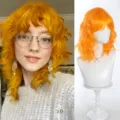 Short orange wavy bob synthetic wig with bangs for women, natural looking daily wear hair. - Orange