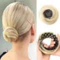 Synthetic blonde hair bun extension with retractable bird nest claw clip for easy styling detail - Light Ash Blonde (85H80)