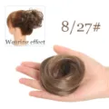 Détail de chignon en cheveux synthétiques montrant la texture naturelle et la nuance idéale. - 8/27
