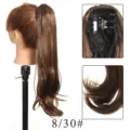 Detail view of synthetic hair ponytail extension claw clip, showcasing hair texture and clip. - Chestnut Brown (8/30#)
