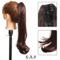 Synthetic hair ponytail extension detail showing secure claw clip and natural wavy ends. - Light Brown (6A#)