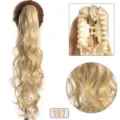 Extensión de cola de caballo sintética larga y ondulada rubia con pinza de garra para mujeres - 55cm / 107 (Rubio Dorado)