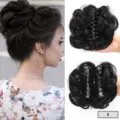 Detailed view of black hair claw bun extension, fluffy messy updo hairpiece for easy styling. - Natural Black