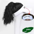 Detailed view of women long curly hair hat, white sun visor baseball cap wig piece. - White Hat Middle Letter Black Curly Hair