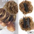 Synthetic claw clip messy hair bun hairpiece with black clip, blonde highlighted hair. - Chestnut And Gold