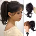 Détail de la perruque queue de cheval avec pince et mèches naturelles effet wavy. - Calicot