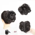 Detailed view of fluffy synthetic hair bun with claw clip, natural wavy design for quick styling. - 4