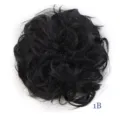 Dettaglio crocchia capelli scompigliati sintetici, colore nero naturale 1B, toupet voluminoso. - Stile Nero (1B)
