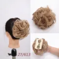 Detailed close-up of synthetic messy hair bun claw clip showing texture and secure grip. - Golden Blonde Bleach Blonde (27/613)