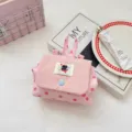 Pink polka dot cosmetic bag detail, featuring a flap, handle and cute cat patch. - Peach Pink Polka Dot