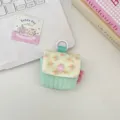 Kord-Blumen-Minikopfhörertasche mit Druckknopf und Ring, ästhetisches Design Detailansicht. - Hellgrün