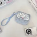 Cute quilted polka dot wrist pouch with silver flap and heart snap for daily small items. - Flip Snap Style (67282) / Heart Light Blue
