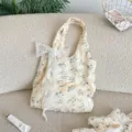 French style yellow floral fabric shoulder bag with elegant white lace bow for casual travel. - Vest Bag with Lace Bowknot