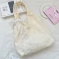 Creamy embroidered canvas tote bag with lace bow, casual shoulder bag for student daily outings. - Lace Bow and Small Flower Style / Off White