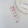 Plaid fabric cable organizer strap with cute heart snap button for tidy desktop storage. - Blue Plaid Sakura Pink