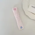 Pink floral cord organizer strap with cute heart and round buttons for earphone cable storage. - Floral Dot Pink