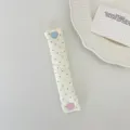 Cute polka dot fabric cable organizer strap with heart snap button for neat cord storage. - Beige Polka Dot