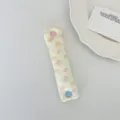 Floral pattern cable organizer strap with cute heart snap for neat earphone storage. - Corduroy Peach Blossom Pink