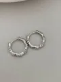 Close-up detail of silver bamboo hoop earrings, glossy metallic finish for daily wear. - Bamboo Joint Style - White (Large)