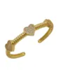 Bracelet jonc torsadé plaqué or avec charms cœur en zircone pavé, style bijou tendance. - Bracelet jonc / Or