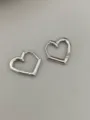 Detailed close-up of silver bamboo heart huggie earrings, minimalist and elegant design. - Heart Style - White (Medium)