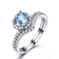Eleganter 925 Sterling Silber Ring mit hellblauem Edelstein und funkelndem Doppelband. - Größe 9 / Runder Topas Doppelreihige Einlage (RUJ059B-1 Hao) / Blau