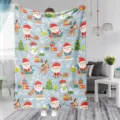 Detailed view of the Christmas flannel blanket with festive Santa and reindeer print patterns. - 70x100 (230g/㎡ Flannel) / Blue Base Santa