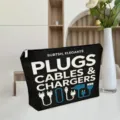Detail view of black canvas zipper pouch with plugs cables text and white flower decor background. - ZYHZB8133-1