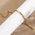 Bracelet à maillons géométriques dorés avec extension, bijou élégant en acier titane pour femmes. - Chaîne à Segments Géométriques / Or