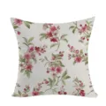 Vista detallada de una funda de cojín floral rosa vintage, ideal para decorar el sofá de casa. - Estilo Floral 6