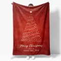 Detailed view of a soft red flannel Christmas blanket featuring a white abstract tree print. - MT06018-3 / 100x150 Single-Sided Print (260g/㎡ Flannel)