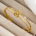 Minimalistisches 18k vergoldetes Titanstahl Doppelschicht Knoten offenes Armband Damen. - Doppelschicht Verflochtener Stil (szkk087) / Gold