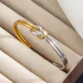 Zweifarbiger Titanstahl Knoten Armreif, offener Armspange minimalistischer 18k Goldschmuck. - Feine Linien-Stil (szkk180) / Zweifarbig (Gold & Silber)