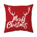Close-up detail of the red Christmas pillow cover with white reindeer antlers and text print. - Style 3 / Peach Skin Velvet 45x45cm