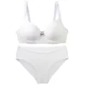 Detailed view of a white women lingerie set, featuring textured grid pattern and comfortable fit. - 75B / White