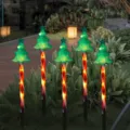 Solar Christmas tree lawn stakes with candy cane poles and warm LED lights for yard decor - Waterproof Battery Box - 8 Modes / Red Tube Christmas Tree (Set of 5)