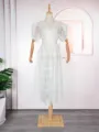 White lace V-neck dress detail, featuring delicate hollow floral pattern and short sleeves. - L / White