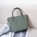 Green leather tote bag for women, stylish top handle handbag with adjustable crossbody strap. - Almond Green