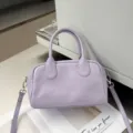 Bolso Boston de cuero morado claro, un bolso de mano versatil y bandolera para mujer. - 25-12-15cm / Yves Saint Laurent