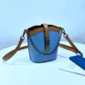 Leather bucket bag blue brown colorway with stylish metal chain and shoulder strap variant - Fog Blue
