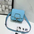Blue leather crossbody bag with silver hardware, stylish shoulder handbag for women. - 18 x 3 x 12 cm / Azure Blue