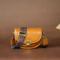 Vintage brown leather saddle bag with colorful wide strap, stylish women's shoulder crossbody. - Sunset Yellow