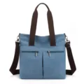 Casual canvas shoulder bag for women, blue tote handbag with crossbody strap and front pockets. - Blue