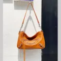 Brown leather motorcycle shoulder bag with metal studs and tassels for women daily use - 28*9*19 cm / Yellow Brown