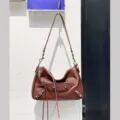 Brown leather motorcycle shoulder bag with metal studs and tassel details for women daily use - 28*9*19 cm / Chocolate