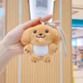 Cute plush puppy keychain with braided strap, soft toy pendant detail view for bags and keys. - Brown Puppy