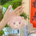 Close up detail of fluffy pink sheep plush keychain toy with gold metal hardware ring. - Purple (Gold Clasp)