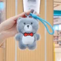 Cute grey plush bear keychain with red bow, soft animal pendant toy for backpack or keys. - Grey Bear