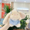 Close-up detail of cute plush bunny pendant with floppy ears and blue plaid dress, soft texture. - Blue Dress Hanging Chain / 11cm